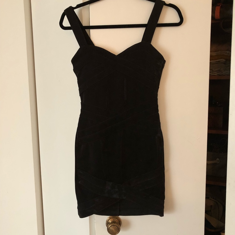 Classic but trendy black cocktail dress.